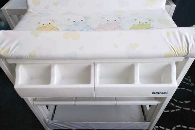 baby bed and changing table