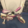 Selling: Pink cycle with training wheels 